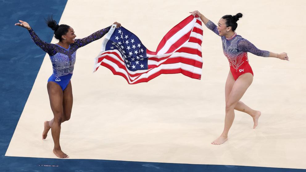 PHOTO: Gold medalist Simone Biles and bronze medalist Sunisa Lee of the U.S celebrate after the artistic gymnastics women's all-around final at the 2024 Paris Olympics, Aug. 1, 2024.