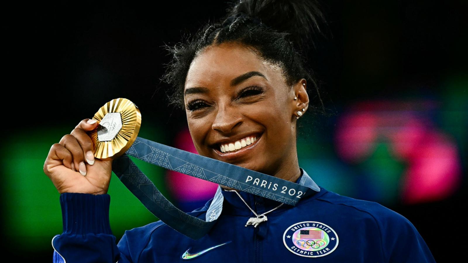 PHOTO: Gold medalist Simone Biles of the U.S. poses with her medal during the podium ceremony after the artistic gymnastics women's all-around final at the 2024 Paris Olympics, Aug. 1, 2024.