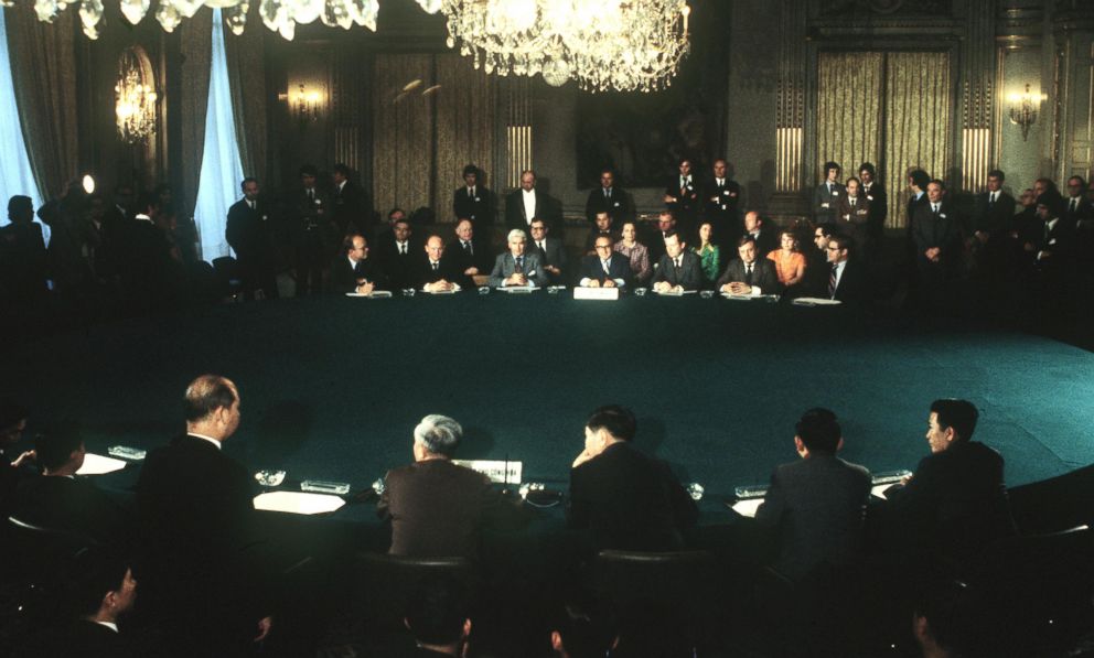PHOTO: Secretary of State Henry Kissinger and Le Duc Tho, Hanoi's chief negotiator, seated at a conference table during the signing of a joint 14-peace agreement between the United States, North and South Vietnam and the GRP, June 13, 1973 in Paris.