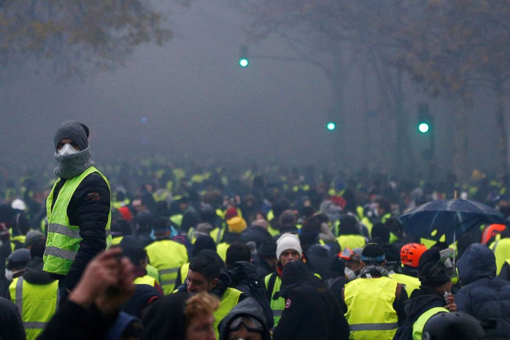 PHOTO: Protesters wearing yellow vests, a symbol of a French drivers' protest against higher diesel taxes, demonstrate near the Place de l'Etoile in Paris, Dec. 1, 2018.