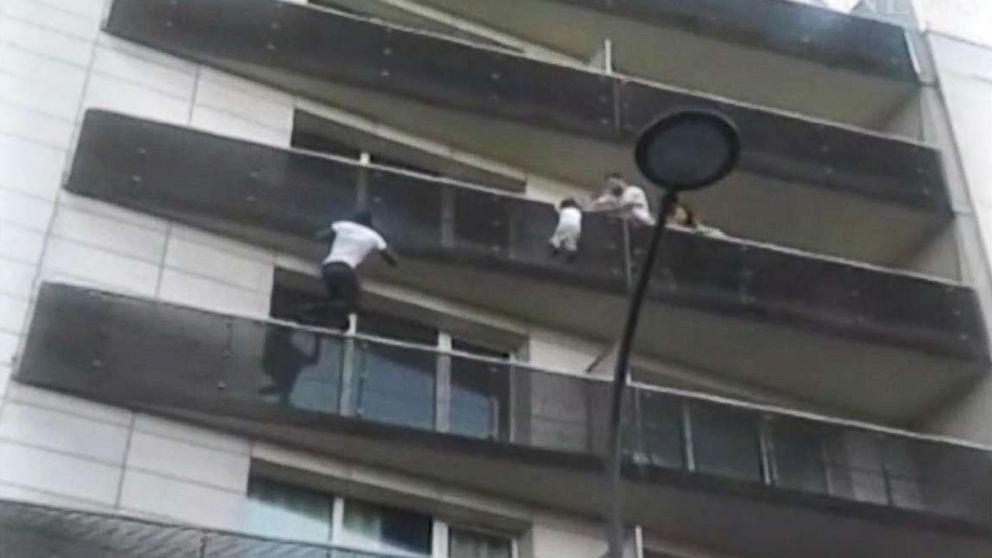 PHOTO: A video by Tadek Dandach shows Mamoudou Gassama, 22, from Mali, scaling the outside of an apartment building to rescue a four-year-old boy in Paris. 