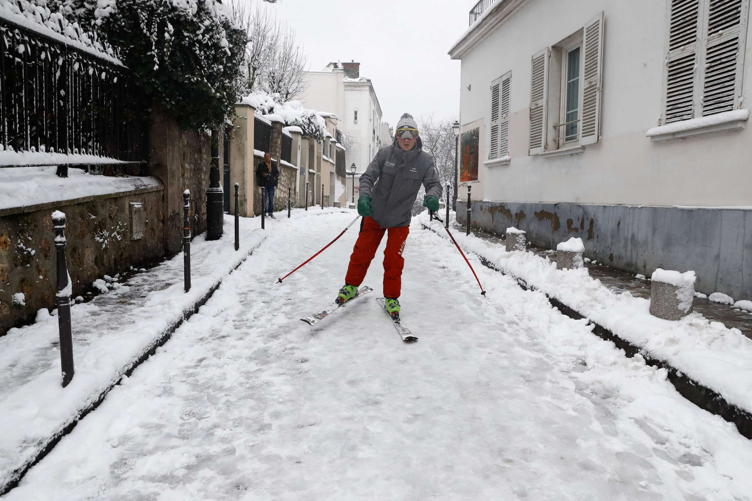 PHOTO: A man skis on a snow covered street of Montmartre, Feb. 7, 2018, following heavy snowfall in Paris. 