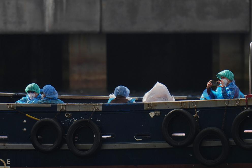 PHOTO: Passengers are disembarked from the hantavirus-stricken cruise ship MV Hondius at the port of Granadilla in Tenerife, Canary Islands, Spain, Sunday, May 10, 2026.