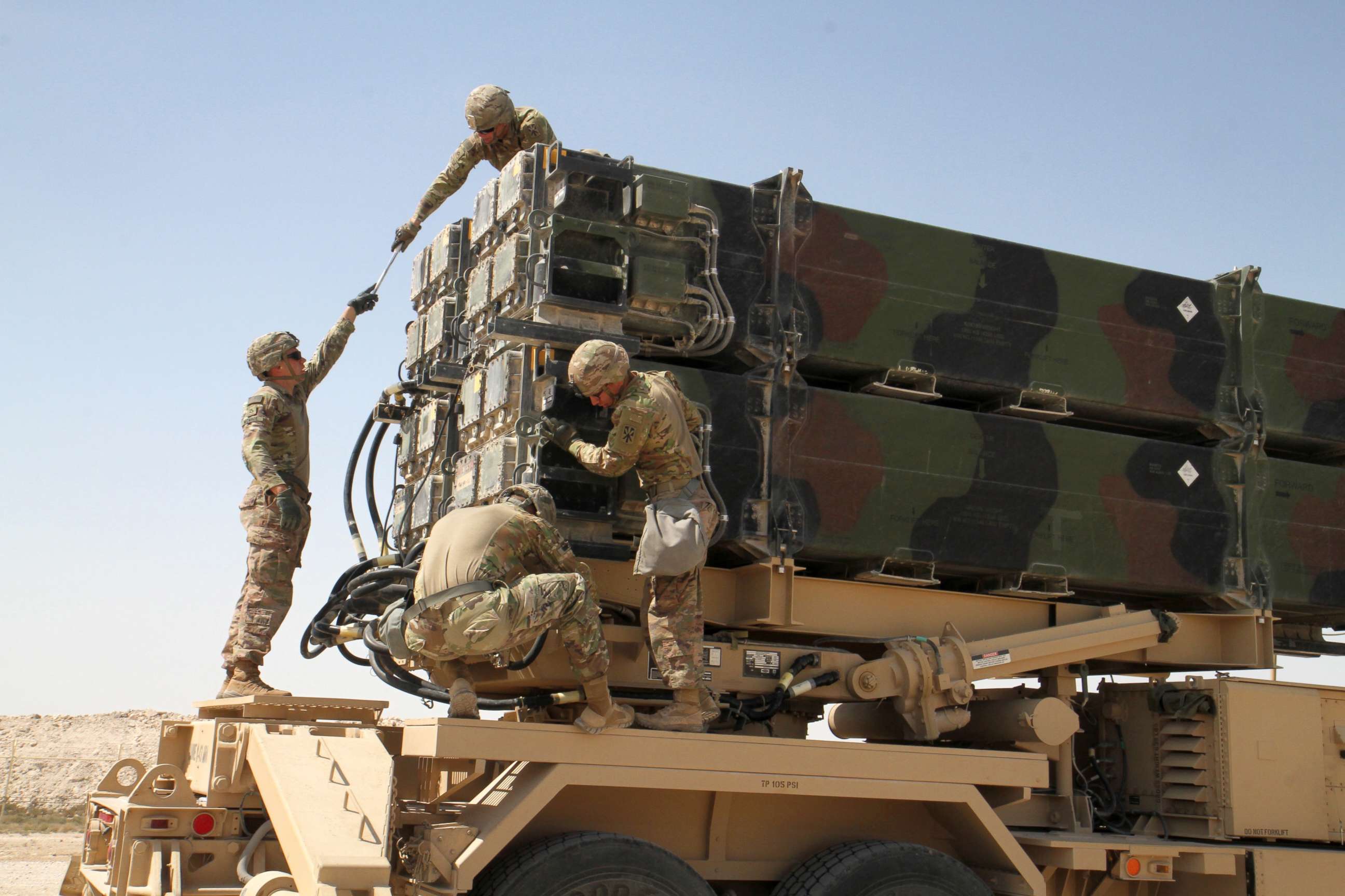 PHOTO: Soldiers from Battery C, 43rd Air Defense Artillery Regiment work together to prepare a Patriot missile launcher for reloading, March 7, 2019.