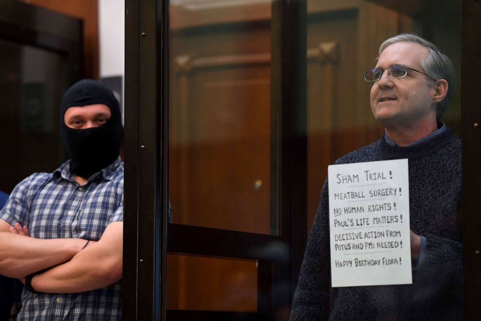 PHOTO: Paul Whelan, a former US marine accused of espionage and arrested in Russia in December 2018, stands inside a defendants' cage as he waits to hear his verdict in Moscow on June 15, 2020.