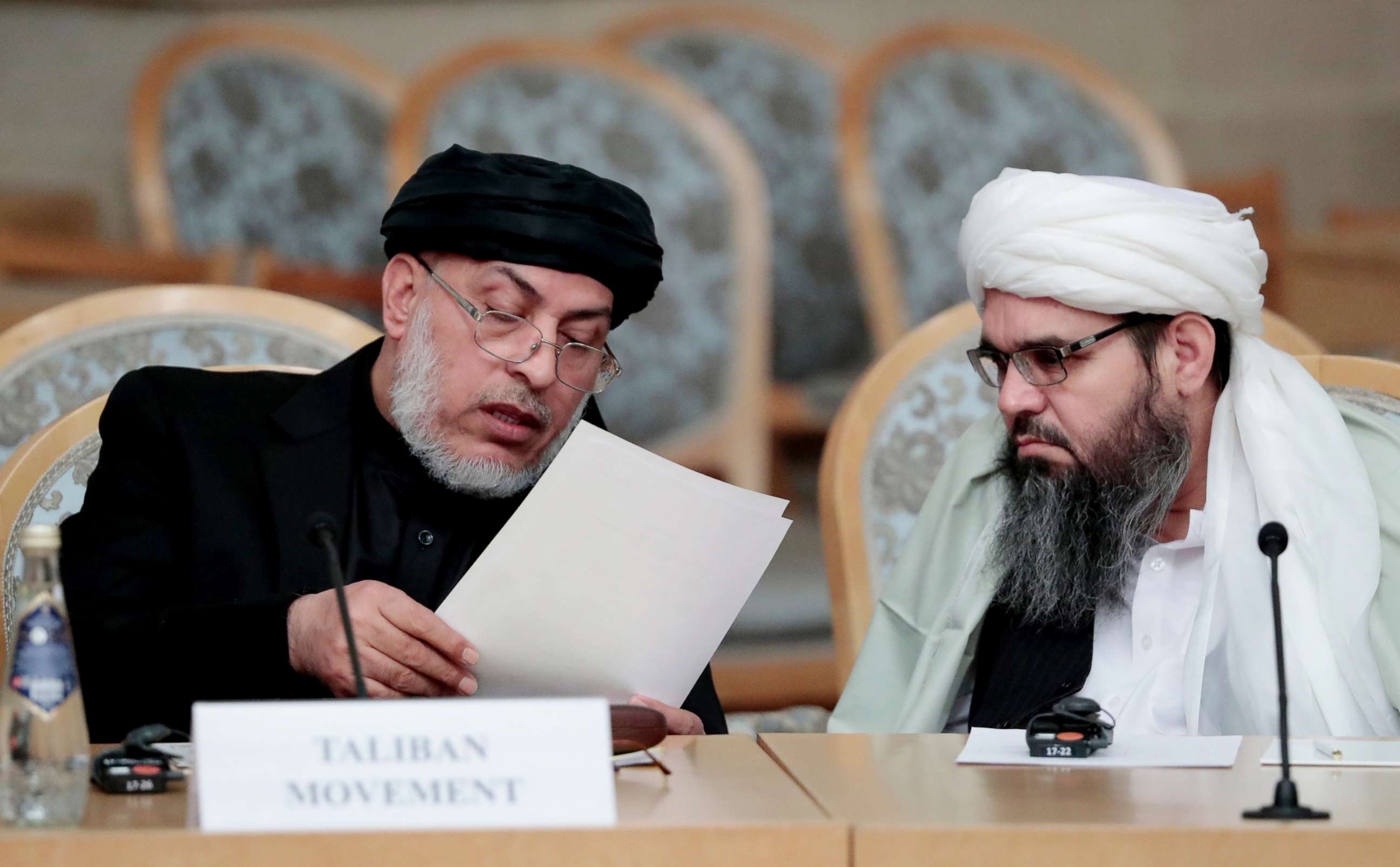 PHOTO: Unidentified representatives of the Afghan Taliban movement speak prior to the start of the second Moscow round of Afghanistan peace settlement talks on Nov. 9, 2018.
