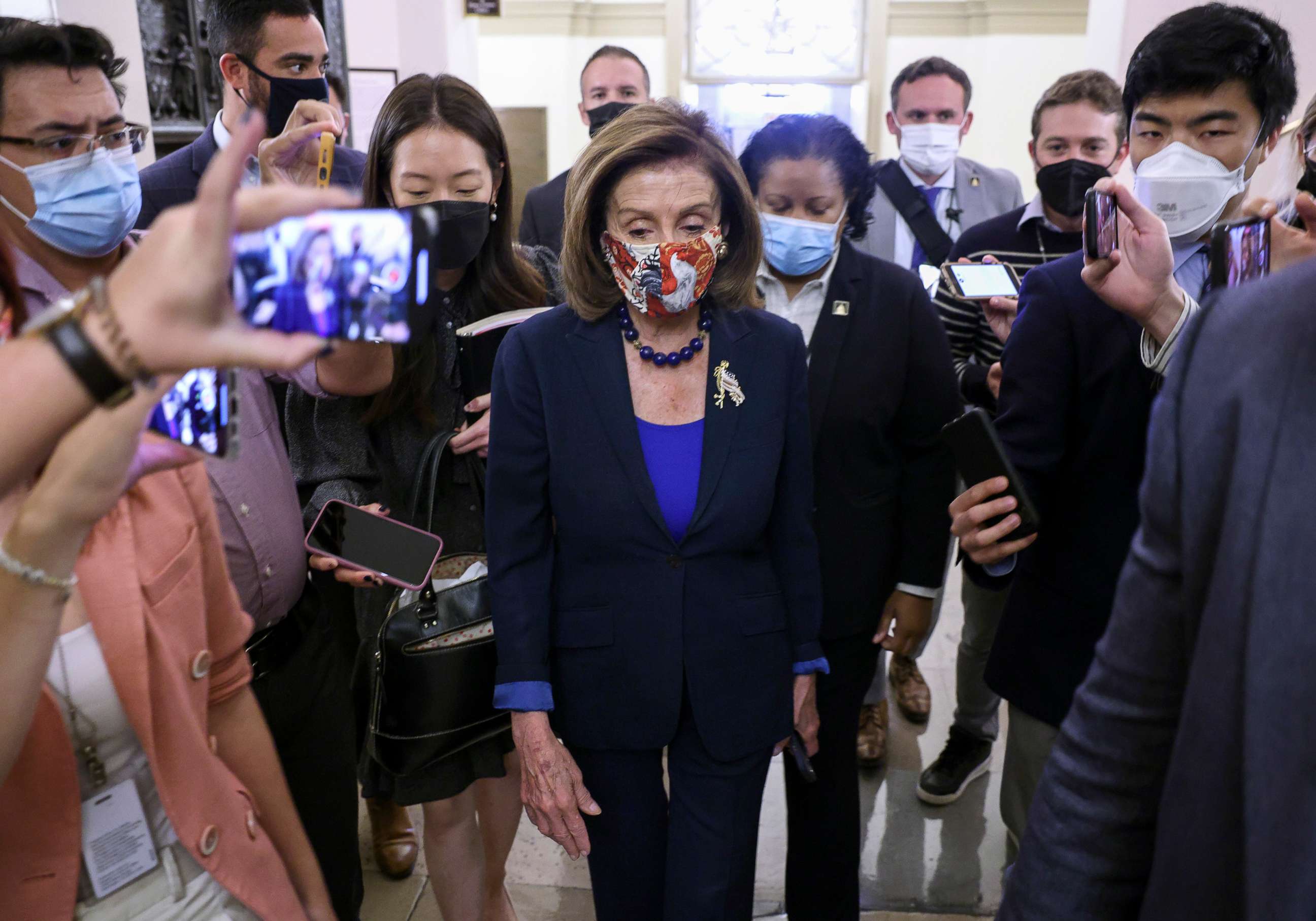 PHOTO: Speaker of the House Nancy Pelosi is surrounded by members of the media as she arrives at the U.S. Capitol on Oct. 01, 2021, in Washington.