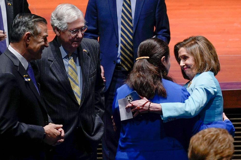 PHOTO: House Speaker Nancy Pelosi, right, greets Ukrainian Ambassador to the U.S., Oksana Markarova, with Senator Mitch McConnell, left, as they arrive to hear Ukrainian President Volodymyr Zelenskyy speak to Congress, March 16, 2022 in Washington, D.C.