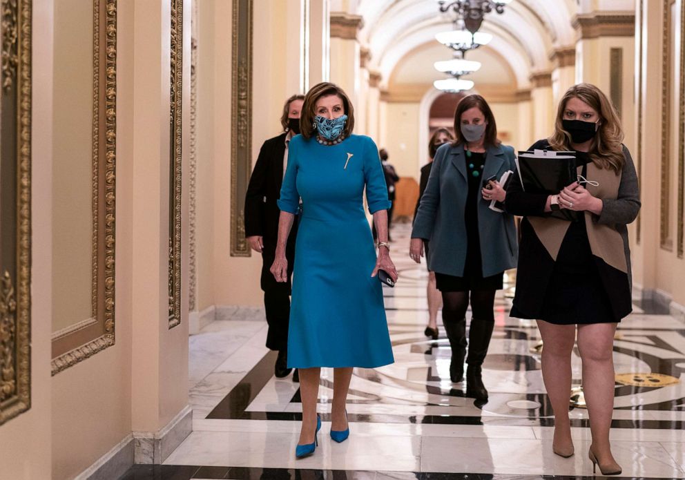 PHOTO: Speaker of the House Nancy Pelosi leaves the chamber after midnight during a lengthy floor speech by House Minority Leader Kevin McCarthy, who disrupted a planned vote on the Build Back Better Act, at the Capitol in Washington, early Nov. 19, 2021.