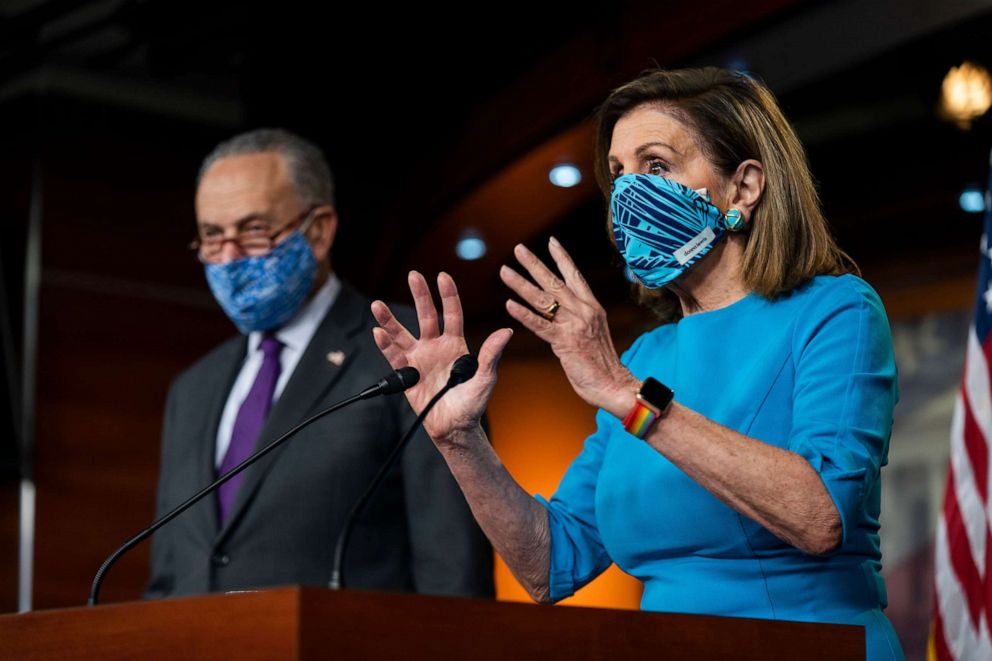 PHOTO: Speaker of the House Nancy Pelosi and Senate Minority Leader Chuck Schumer speak to the media about the presidential transition in the US Capitol in Washington, Nov. 12, 2020.