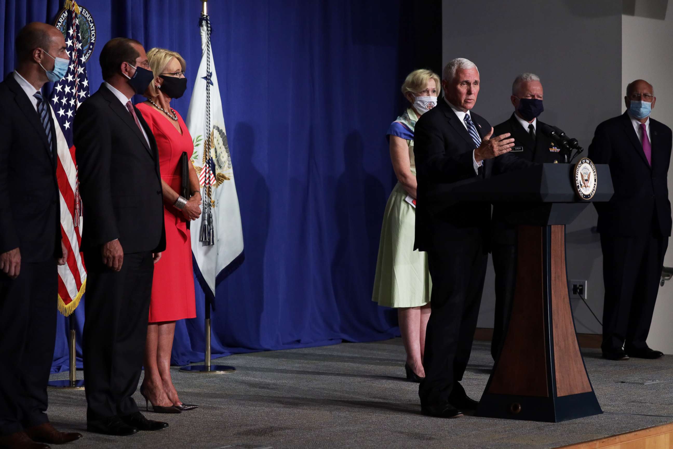 PHOTO: Vice President Mike Pence speaks as Eugene Scalia, Alex Azar, Betsy DeVos, Deborah Birx, Brett Giroir and Robert Redfield listen during a White House Coronavirus Task Force press briefing, July 8, 2020 in Washington.