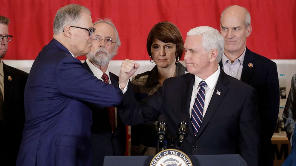 Vice President Mike Pence, who is leading the White House's coronavirus task force, bumped elbows with Washington Gov. Jay Inslee and other officials upon his arrival in Tacoma, Washington.