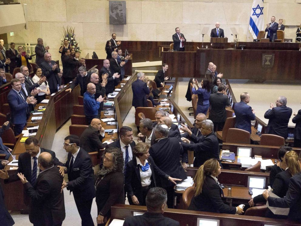 PHOTO: Israels Arab parliamentary bloc and Knesset members scuffle with security after they held signs in protest during the speech of U.S. Vice President Mike Pence in Israels parliament in Jerusalem, Jan. 22, 2018.