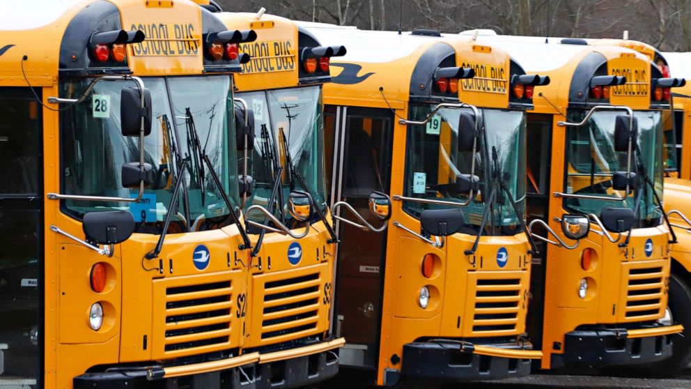 PHOTO: Parked school buses are idled during school closings due to the COVID-19 and coronavirus outbreak, March 30, 2020, in Zelienople, Pa. 