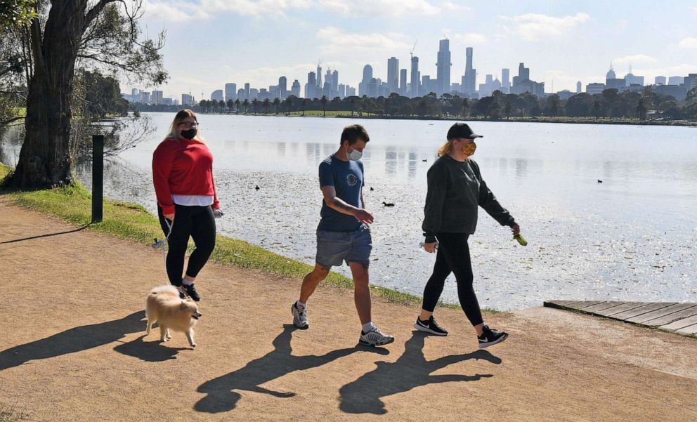 PHOTO: People exercise alongside Albert Park Lake in Melbourne, Australia, on Aug. 10, 2020, as the city struggles to cope with an outbreak of the novel coronavirus.