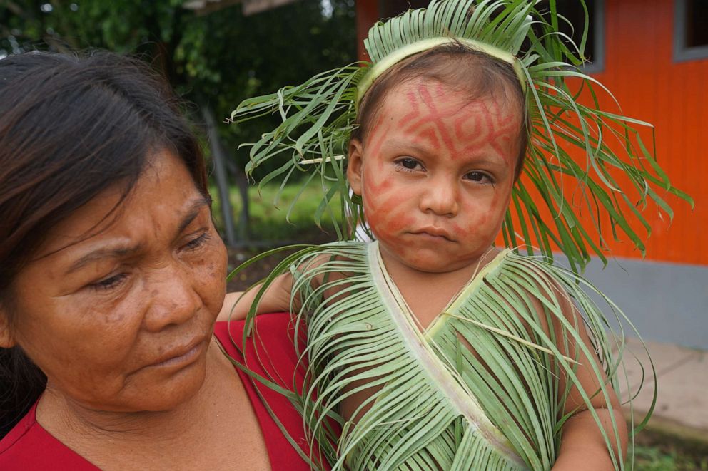 PHOTO: An indigenous Kakataibo grandmother and her grandchild in Peru’s Ucayali region. Last year saw an uptick in deforestation in this dense jungle area.