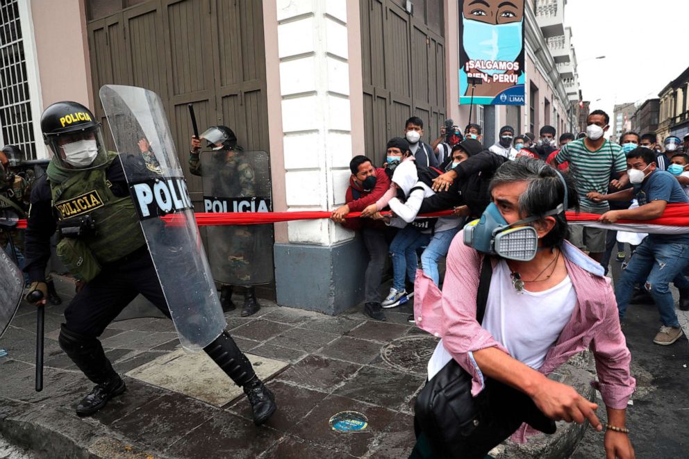 PHOTO: Police block supporters of former President Martin Vizcarra from reaching Congress while lawmakers swear-in Manuel Merino as the new president in Lima, Peru, Nov. 10, 2020. Vizcarra was ousted over his handling of the coronavirus pandemic.