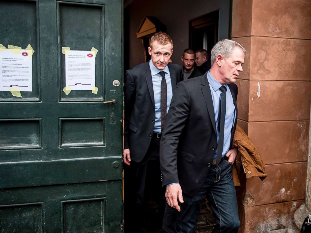 PHOTO: Prosecutor Jakob Buch-Jepsen (L) and deputy police director Jens Moeller (C) leave for a break at the courthouse in Copenhagen, on March 8, 2018.