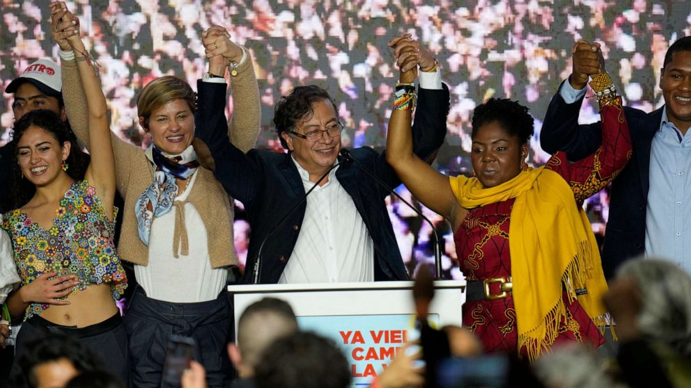 PHOTO: Presidential candidate Gustavo Petro, center, and his running mate Francia Marquez, at his right, of the Historical Pact coalition, in Bogota, Colombia, Sunday, May 29, 2022.
