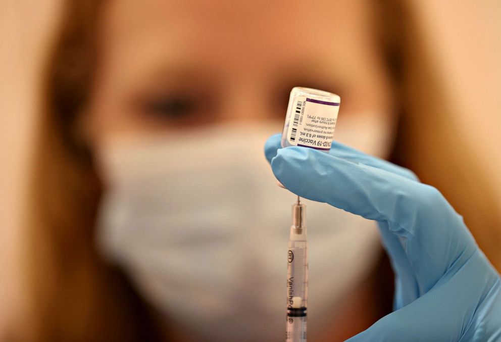 PHOTO: Safeway pharmacist Ashley McGee fills a syringe with the Pfizer COVID-19 booster vaccination at a vaccination booster shot clinic on Oct. 01, 2021, in San Rafael, Calif.