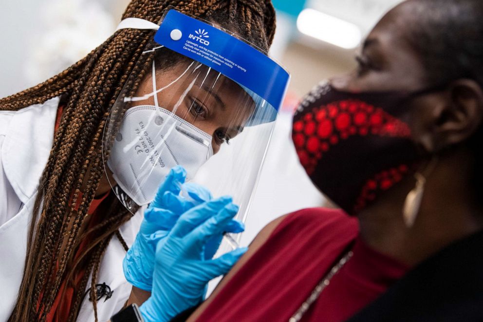 PHOTO: Hattie Pierce, 75,  receives a Pfizer COVID-19 vaccine booster shot from Dr. Tiffany Taliaferro at the Safeway on Capitol Hill, in Washington, D.C., on Oct. 4, 2021.