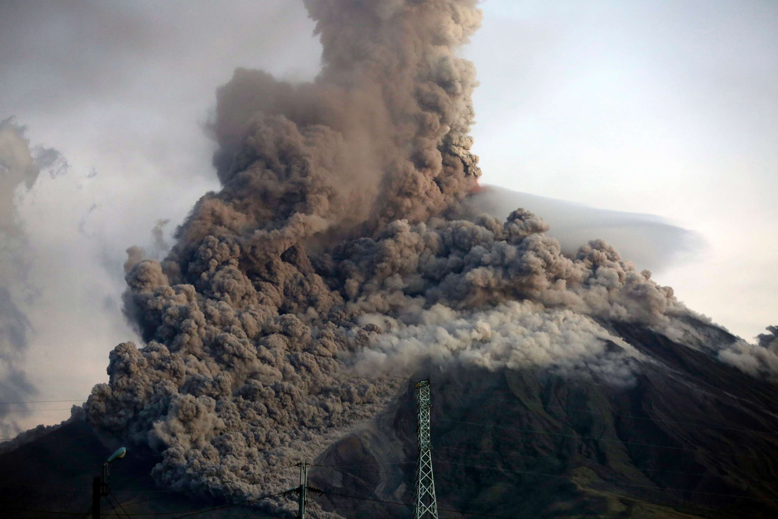 PHOTO: A view of Mayon Volcano erupts anew in the town of Daraga, Albay province, Philippines, Jan. 24, 2018. Mayon volcano located in eastern Philippines and active over the last 10 days spewed fresh lava and ash in two new eruptions a day earlier. 