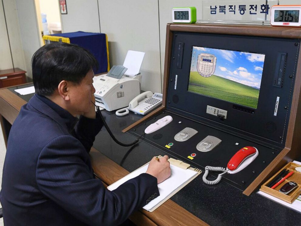 PHOTO: A South Korean government official communicates with a North Korean officer during a phone call on the dedicated communications hotline at the border village of Panmunjom in Paju, South Korea, Jan. 3, 2018.