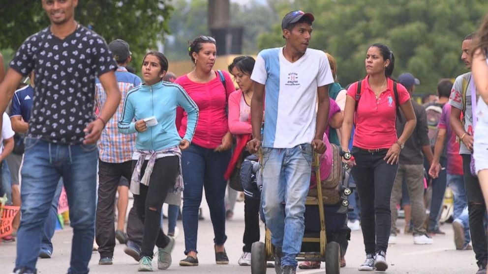 PHOTO: People cross the Simon Bolivar International Bridge from Venezuela into Cucuta, Colombia. More than 2 million Venezuelans have fled misery in their country in the past few years.