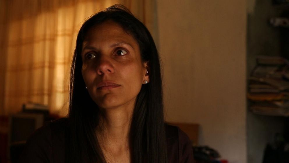 PHOTO: Teacher Vanessa Posada at her home in Venezuela. Soaring inflation and a crashing economy has forced her and her husband to skip meals in order to feed their son.