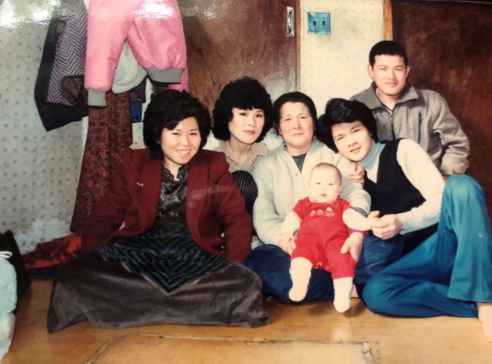 PHOTO: My mom's sister and brothers with Halmony and me when I was a baby.