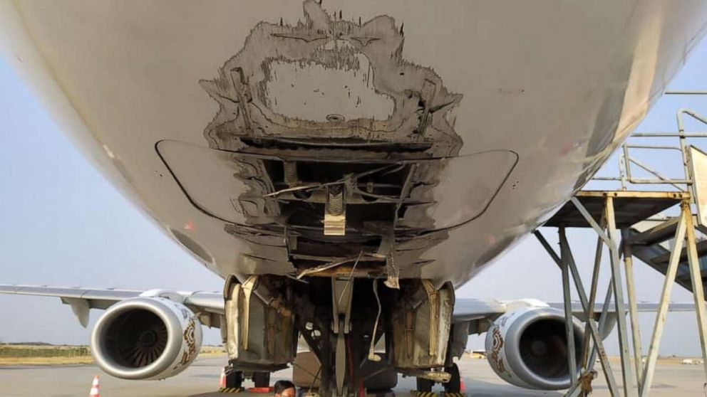 PHOTO: A Myanmar National Airlines flight landed safely with no front landing gear at Mandalay International Airport, May 12, 2019. 