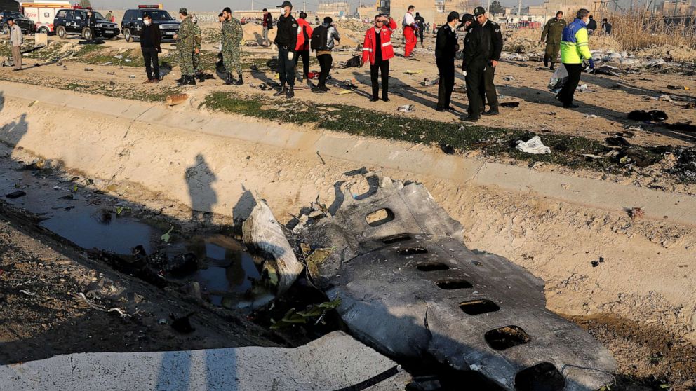PHOTO: Debris is seen from an Ukrainian plane which crashed as authorities work at the scene in Shahedshahr, southwest of the capital Tehran, Iran, Jan. 8, 2020.