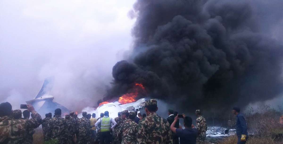 PHOTO: Authorities have rescued at least 17 passengers on a flight that landed in Nepal, skipped off the runway and burst into flames, March 12, 2018.