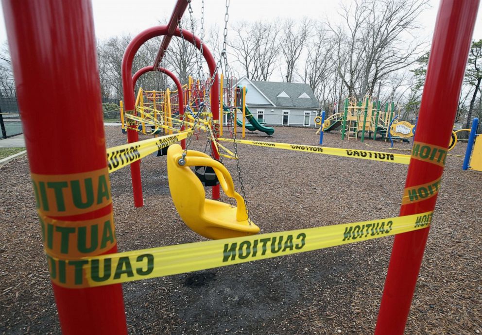 PHOTO: Playground equipment is taped off, March 30, 2020, in the Old Bethpage hamlet of Oyster Bay on Long Island, New York.