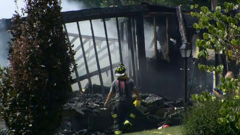 PHOTO: Firefighters work at the scene of a house explosion in Plum, Pa,, on Aug. 12, 2023.