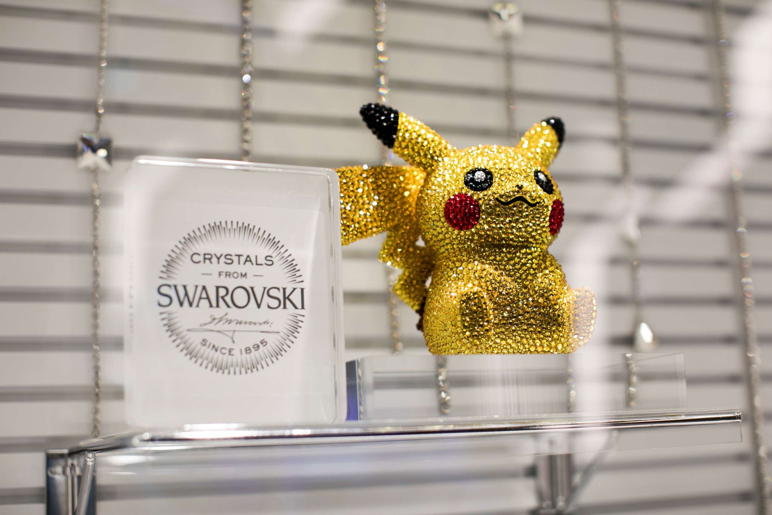 PHOTO: (FILES) In this file photo taken on November 19, 2019, a statuette of Pokemon game character Pikachu, studded with Swarovski crystals, is displayed at a Pokemon store during a press preview in Tokyo.