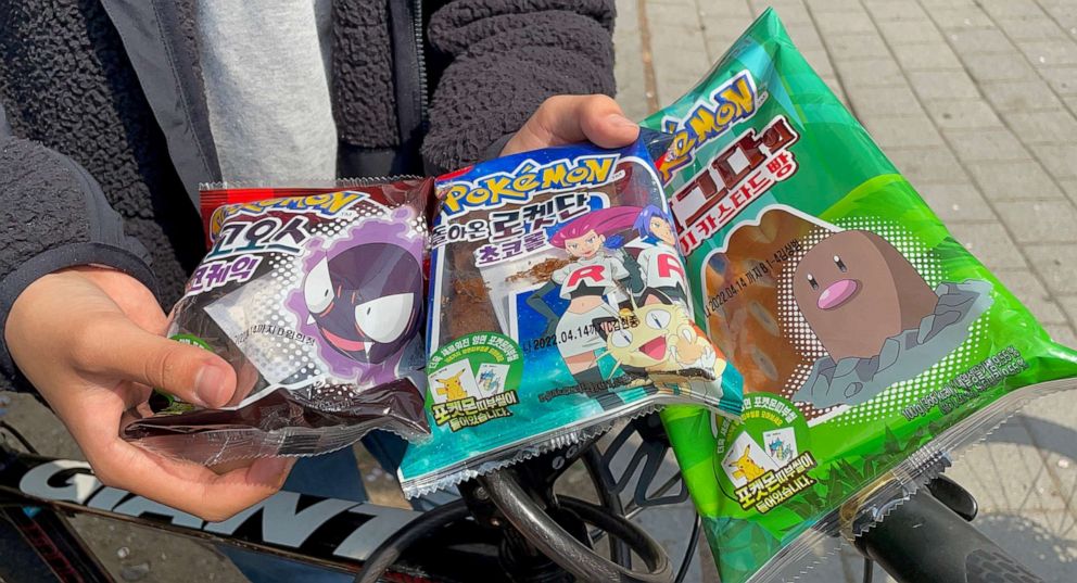 PHOTO: A teenager introduces Pokemon breads he bought in  Yongin, South Korea, April 9, 2022.A teenager introduces Pokemon breads he bought in  Yongin, South Korea, April 9, 2022.