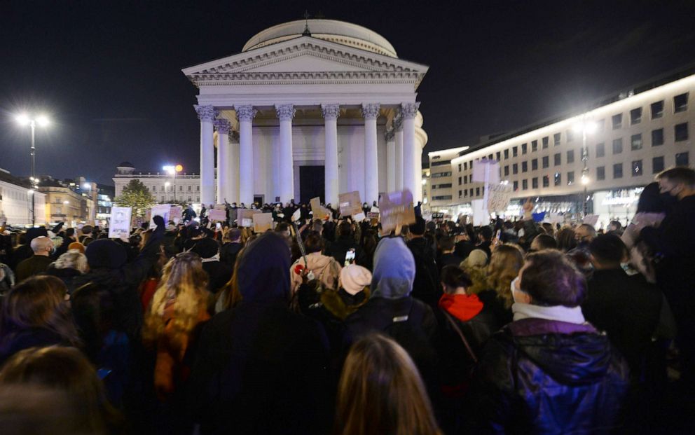 PHOTO: Angered women's rights activists confront police and a far-right group on the fifth day of their nationwide protests against a recent court ruling that tightened Poland's restrictive abortion law, in Warsaw, Poland, on Monday, Oct. 26, 2020. 