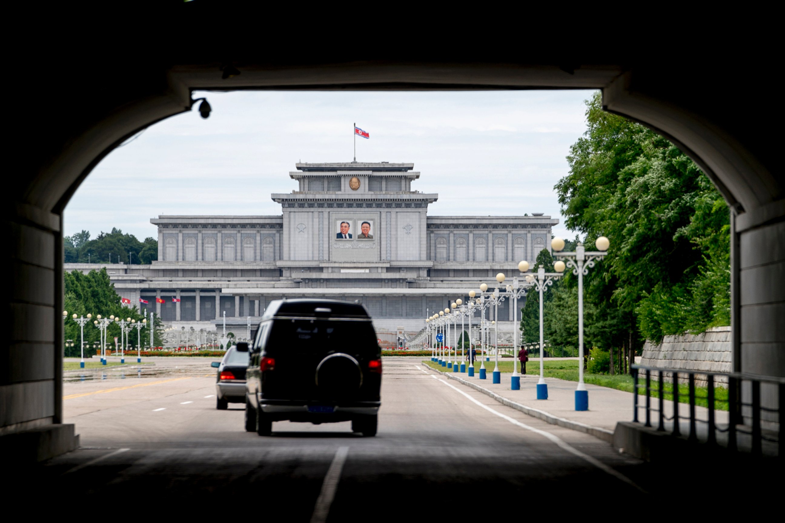 The motorcade carrying U.S. Secretary of State Mike Pompeo drives towards Kumsusan Palace of the Sun in Pyongyang, North Korea, Friday, July 6, 2018. Pompeo is on a trip traveling to North Korea, Japan, Vietnam, Abu Dhabi, and Brussels.