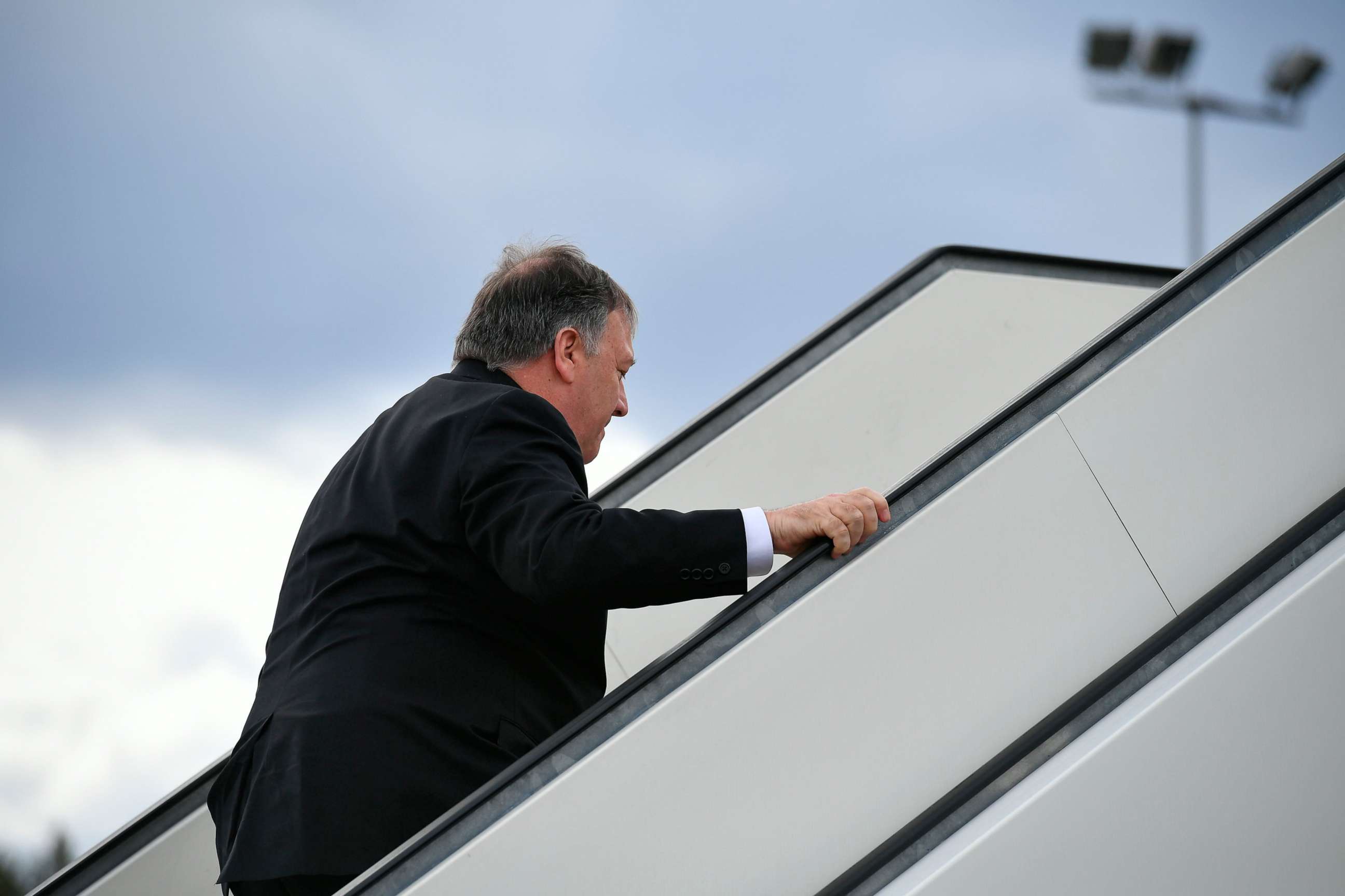 PHOTO: Secretary of State Mike Pompeo boards a plane at Rovaniemi Airport in Rovaniemi, Finland, after taking part in the 11th Ministerial Meeting of the Arctic Council, May 7, 2019.