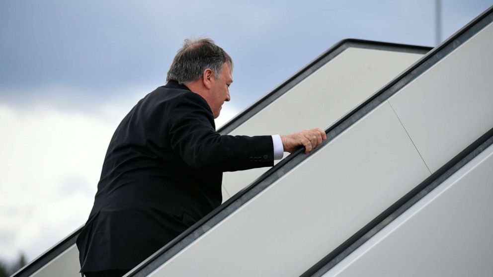 PHOTO: Secretary of State Mike Pompeo boards a plane at Rovaniemi Airport in Rovaniemi, Finland, after taking part in the 11th Ministerial Meeting of the Arctic Council, May 7, 2019.