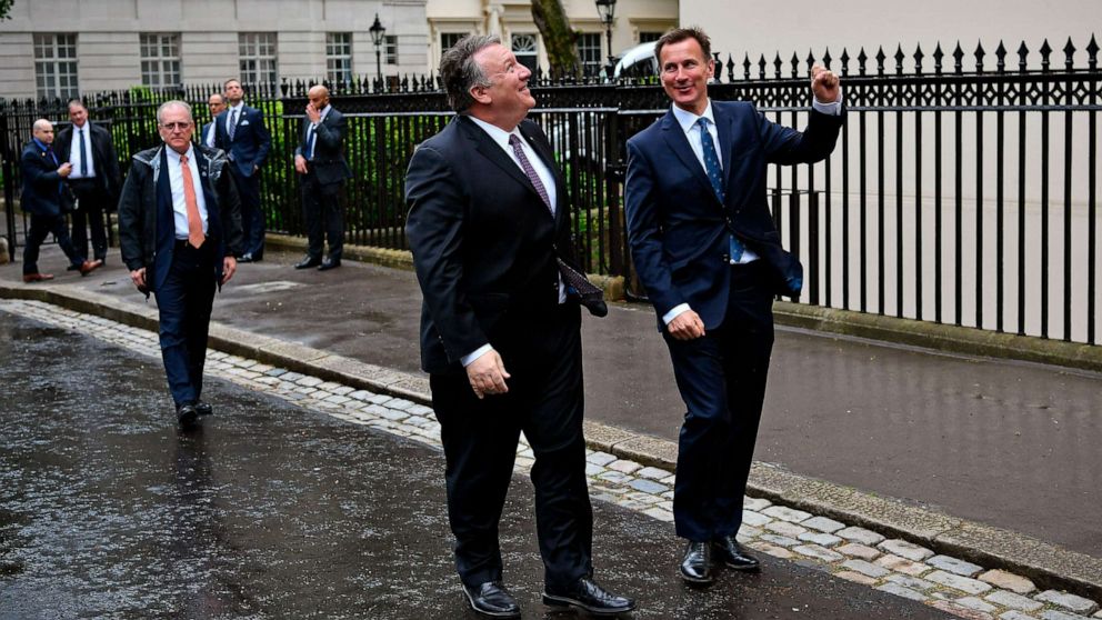 PHOTO: Secretary of State Mike Pompeo is greeted by Britain's Foreign Secretary Jeremy Hunt, right, in central London, May 8, 2019.