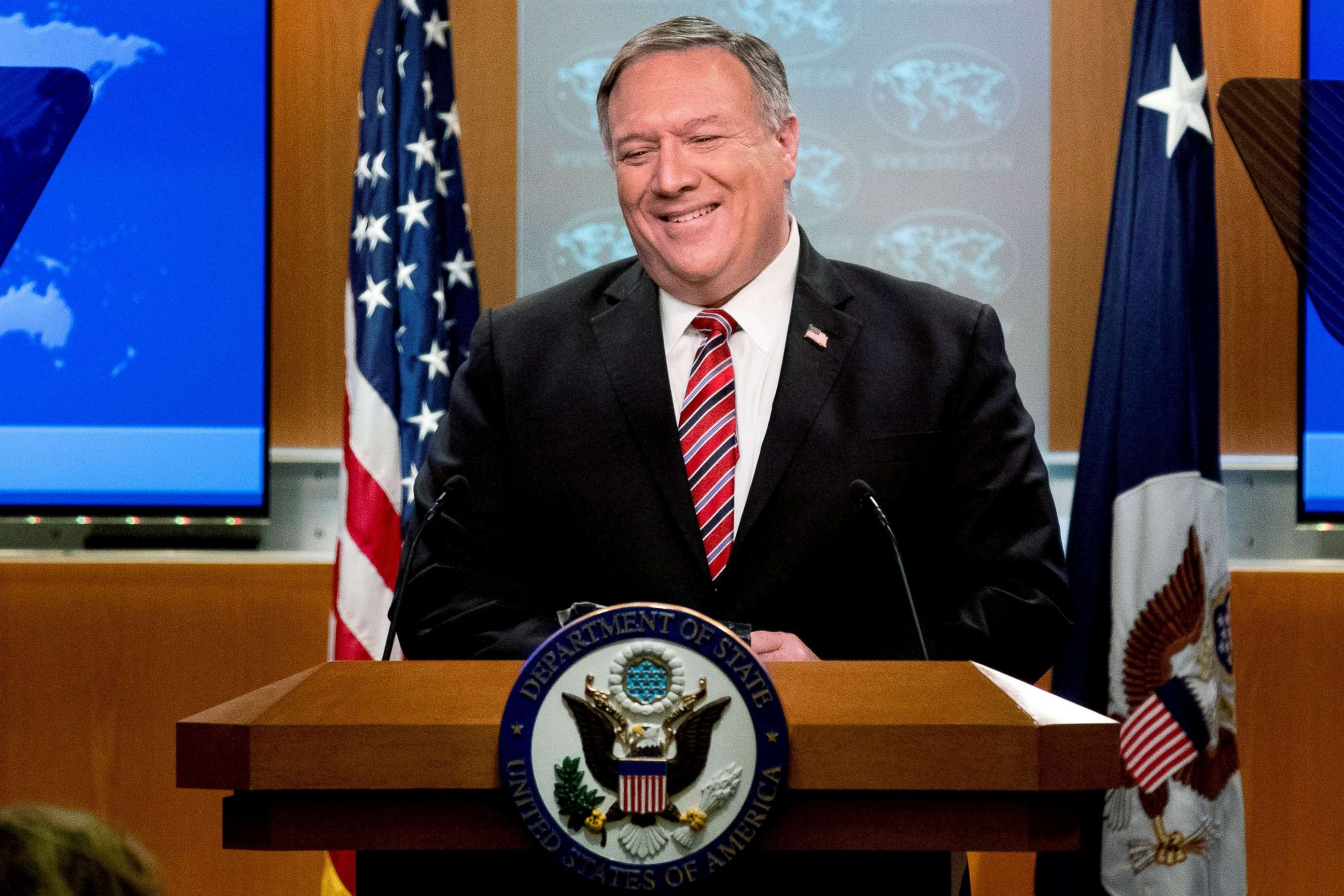 PHOTO: Secretary of State Mike Pompeo smiles during a news conference at the State Department, in Washington, April 29, 2020.