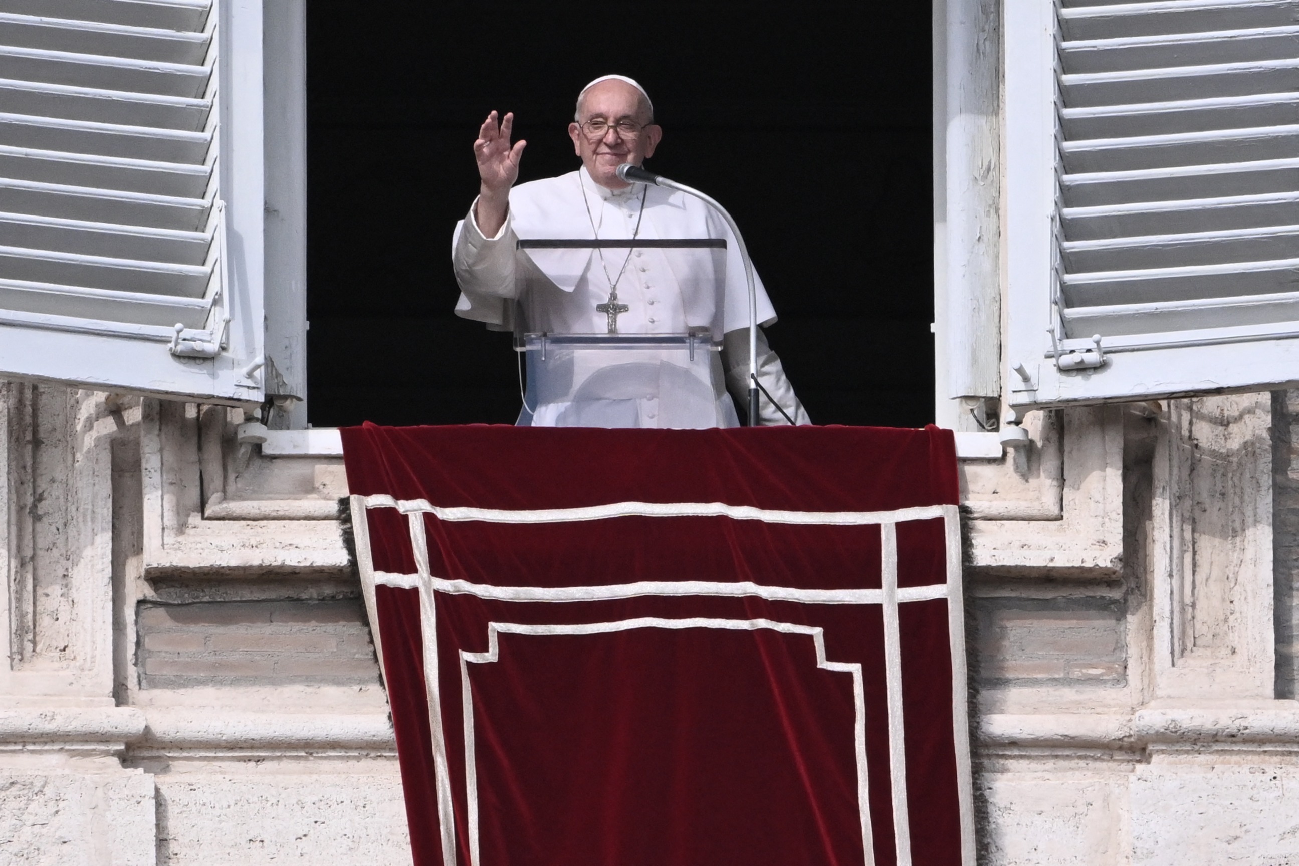 PHOTO: Pope Francis waves from the window of the apostolic palace overlooking St. Peter's square during the weekly Angelus prayer, Oct. 29, 2023, in The Vatican. 