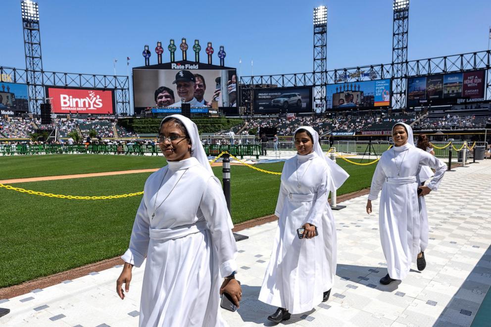 PHOTO: Sisters of St. Carlos convent in Arizona make their way along the field during a public celebration hosted by the Chicago White Sox and the Archdiocese of Chicago for Pope Leo XIV, featuring a mass at Rate Field in Chicago, June 14, 2025. 