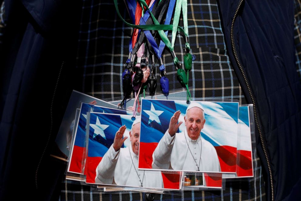 PHOTO: A man exhibits on his chest photos of Pope Francis to sell outside St. Jose Cathedral ahead of the papal visit in Temuco, Chile, Jan. 14, 2018.