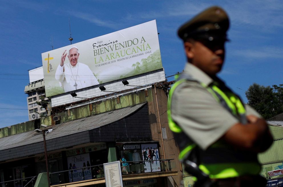 PHOTO: A police officer patrols in front of a banner reading "Pope Francis welcome to La Araucania" ahead of the papal visit in Temuco, Chile, Jan. 14, 2018.