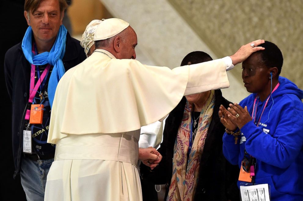 PHOTO: Pope Francis blesses homeless people during an audience for the homeless and socially excluded, in the Paul VI hall on Nov. 11, 2016 at the Vatican. 