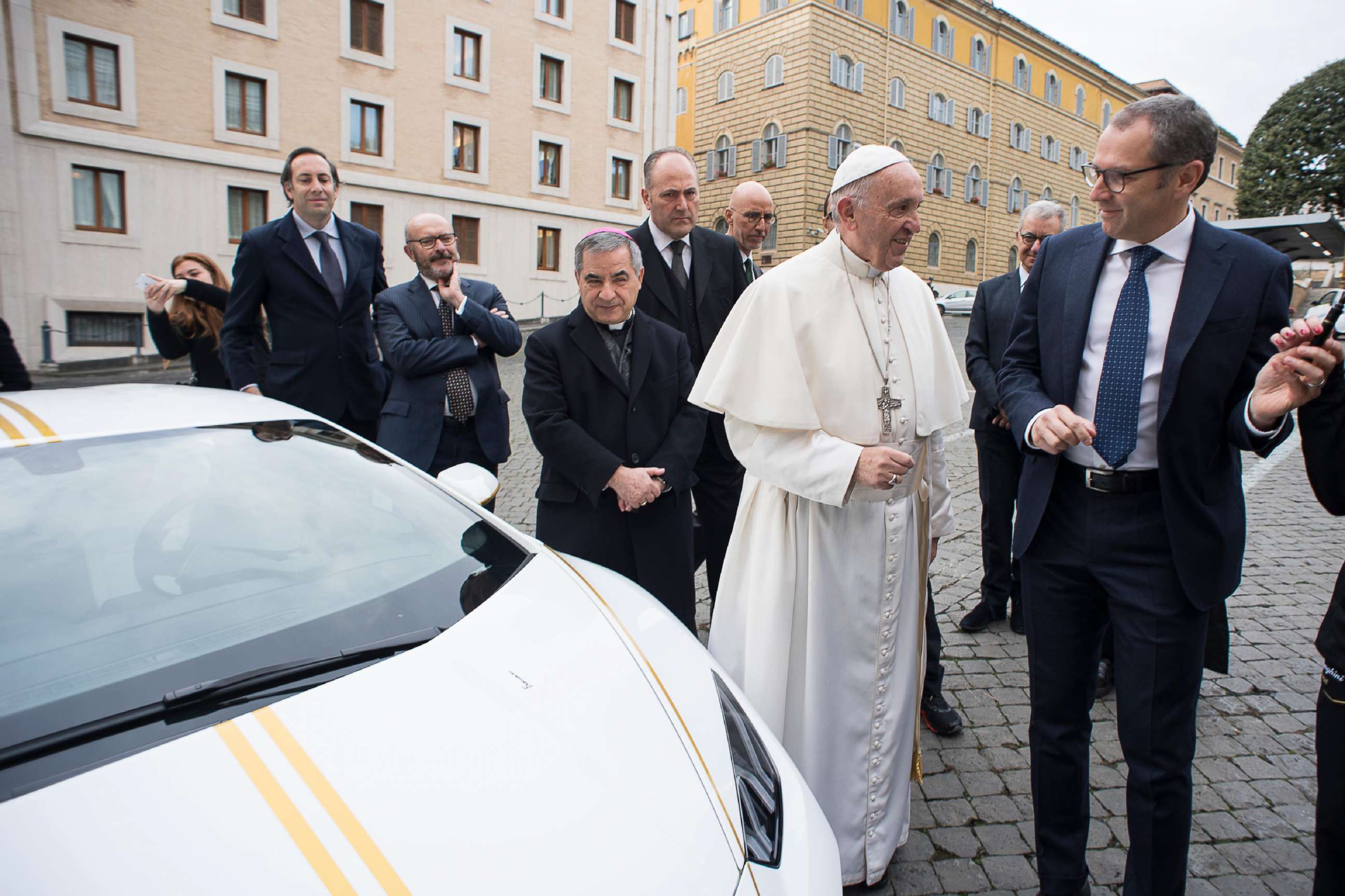 PHOTO: This handout photo taken Nov. 15, 2017, released by the Vatican press office, Osservatore Romano, shows Pope Francis speaking with Lambhorgini CEO Stefano Domenicali (R) after receiving a Lamborghini Huracan as a gift from the Italian car company.