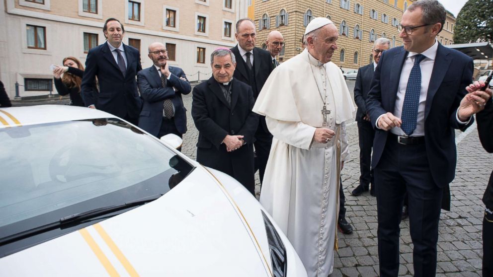 PHOTO: This handout photo taken Nov. 15, 2017, released by the Vatican press office, Osservatore Romano, shows Pope Francis speaking with Lambhorgini CEO Stefano Domenicali (R) after receiving a Lamborghini Huracan as a gift from the Italian car company.